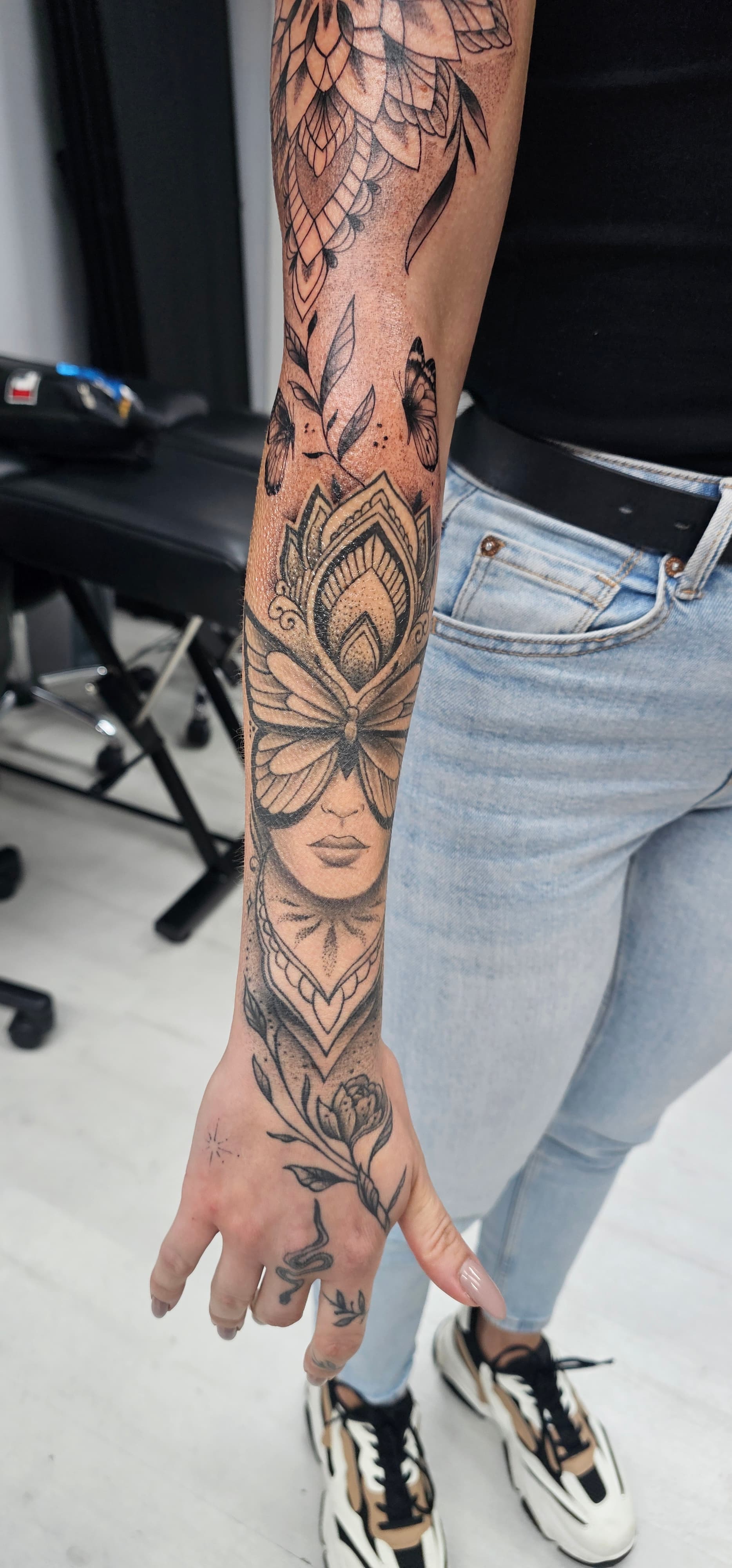 Ornamental mandala and floral forearm sleeve